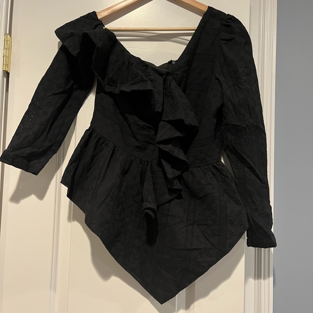 Black eyelet blouse size Medium with tags.